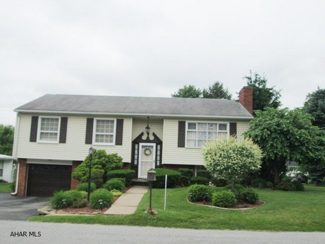 Altoona/Horseshoe Drive - This immaculate bilevel features eat in kitchen and appliances are included.The master bedroom features a half bath. The large living room flows into the dining area. Finished lower level has neat bar area, 1/2 bath and fireplace. The private rear deck overlooks the beautifully landscaped yard.