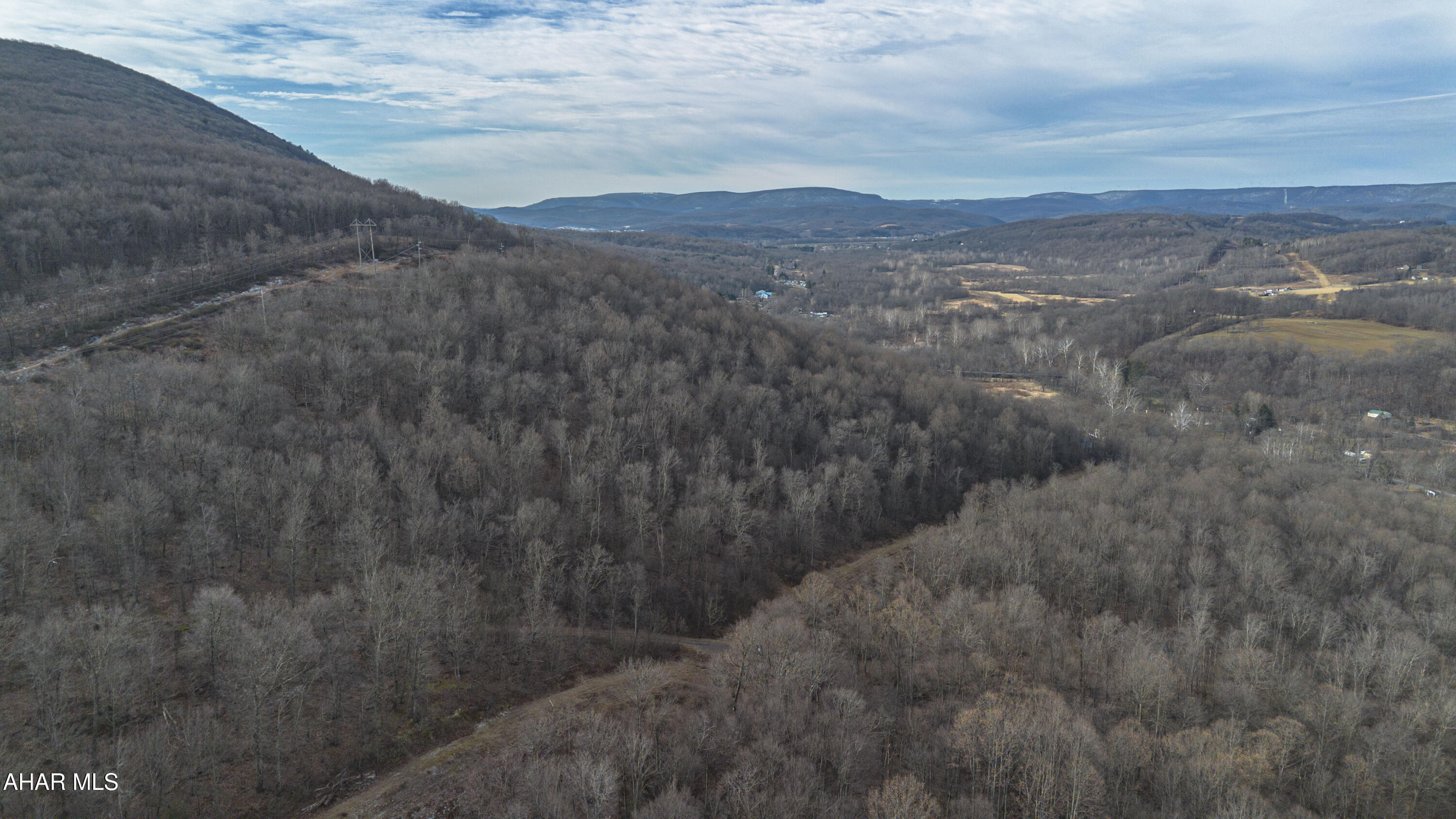 Discover a truly special offering in Hollidaysburg with this expansive 46-acre property ideally located off Reservoir Road. This one-of-a-kind parcel features multiple access points from the road and borders thousands of acres of State Game Lands, offering unmatched privacy and direct access to outdoor recreation. Notably, this property provides access to State Game Lands on this side of the mountain—a rare and valuable feature.

The land includes a small cabin, perfect as a hunting camp and has plenty of wildlife, making it great for hunting or outdoor recreation.

Currently enrolled in Clean & Green, the property benefits from reduced taxes while preserving its natural beauty. Whether you're looking for a recreational getaway, hunting property, or a long-term investment, this remarkable tract offers endless possibilities in a prime location.
