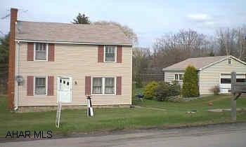 COUNTRY LIVING, ONLY 20 MINUTES AWAY FROM ALTOONA! LARGE LEVEL LOT.