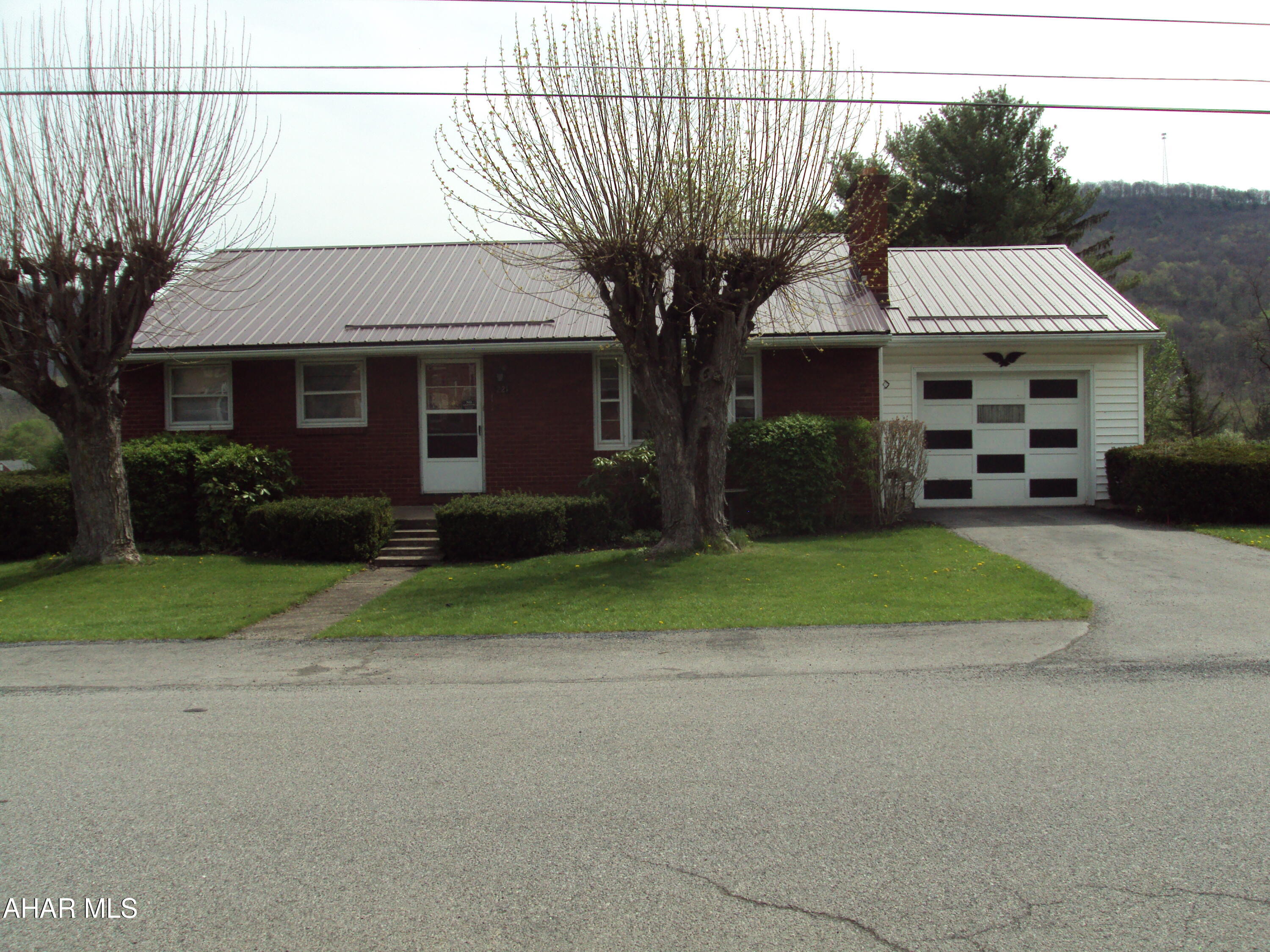 2 Bedroom home on large lot East Freedom area. Wood burning fireplace in Living Room and Basement. Half Bath basement enclosed back porch! 12x32 Barn.