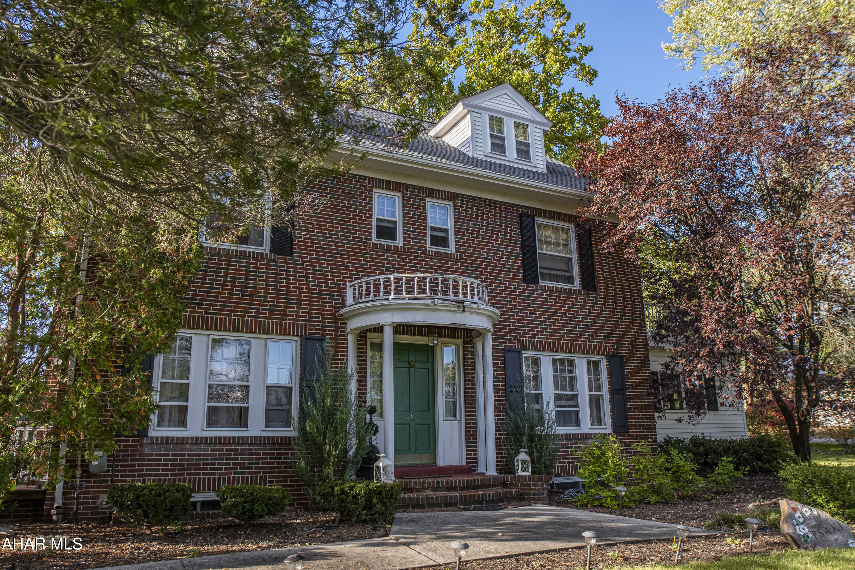 Elegant and spacious Federal-style home in the desirable Sylvan Heights area of Hollidaysburg. This stately 4-bedroom residence sits on a 3/4-acre corner lot and includes a detached garage. Boasting 2,910 square feet, the home features four generous bedrooms and beautiful hardwood floors throughout.