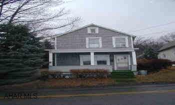 Grey insulbrick sided  house, 2 bedrooms, kitchen, 1 BA, large family room or split family room, dining room, 2 porches, nice size lot, 2 car black top driveway. Cozy 2 bedroom home, great for someone starting out or someone with dogs, nice private backyard  with 2 car blacktop driveway in back.  Offers considered.
