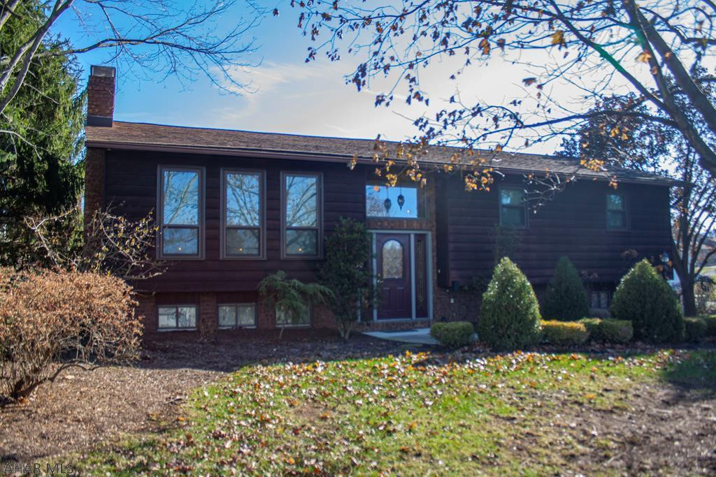 Cedar sided home with great views in Rolling Hills.  Ensuite master bedroom and bathroom and 2 wood fireplaces make this a cozy and warm home.  Vaulted ceilings and and a Trex covered deck are just a few of the amenities.  Wet bar and finished basement and all appliances included.