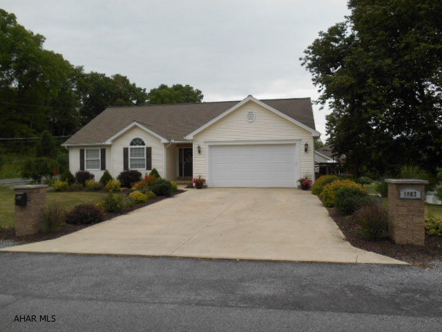 Just as lovely as can be! Wonderful 4/5 bedroom ranch home on a beautiful landscaped corner lot. Cathedral ceilings, beautiful kitchen w/eat in area that opens to back deck. Living room , 3 bedrooms and 2 baths on main level. Terrific  lower level w/ family room, fireplace, bedroom, office , workshop   all opening to lower patio and backyard. Immaculate and ready for a new buyer.