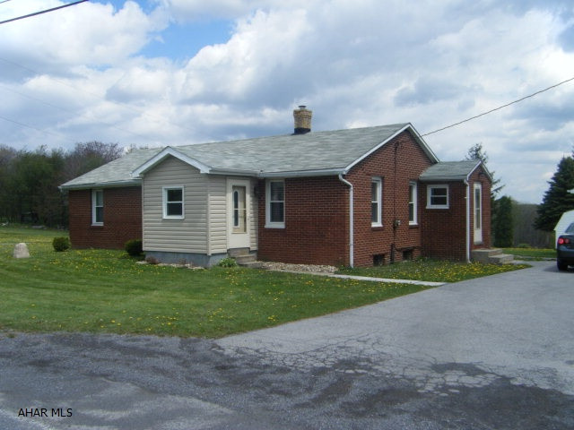 Home recently renovated. Good condition. Interior is one to fall in love with. New kitchen with Maple cabinets, hardwood floors, cathedral ceiling, island with eating counter. 2 car attached garage with shed attached. New wiring and plumbing, insulation. No base trim, some door trim incomplete. Outside basement entry only.