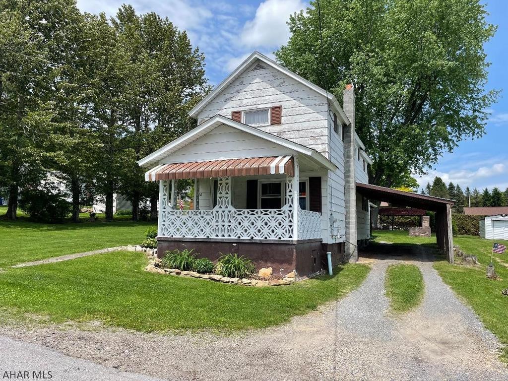 This property is much larger than it looks. Renovated mud room and full bath on first floor. Spacious kitchen with plenty of cabinets and counters, large enough to accommodate a table/chairs, dining area and living room complete the first floor. Upstairs there are three nice sized bedrooms with plenty of storage space. One bedroom is captive. Also half bath is in a bedroom. Newer electrical, and brand new hot water heater. New windows in mud/dining/living rooms, purchased replacement windows for kitchen just need installed by the buyer. Large corner lot. Shed with electricity and an official outhouse. Shield your car from the weather in the carport. Covered porch and covered patio for relaxing. Beautiful garden areas. Call today!