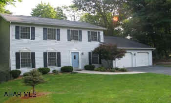 Shuttered 2-Story , superbly maintained home on quiet street. New roof in 2004, new oil furnace fall of 2003, many upgrades.