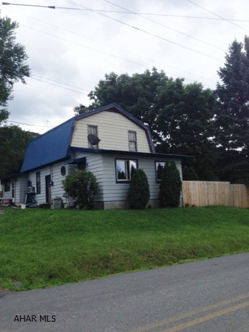 GREAT HANDYMAN'S PROPERTY WITH OVER 1 ACRE OF LAND.  4 BEDROOMS.  2-CAR DETACHED GARAGE.