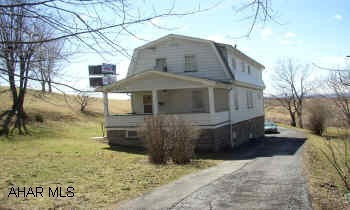 SECLUDED AREA IN ALTOONA. THIS LARGE LOT FEATURES MANY POSSIBILITIES. KITCHEN APPLIANCES ARE INCLUDED. PRICED TO SELL.