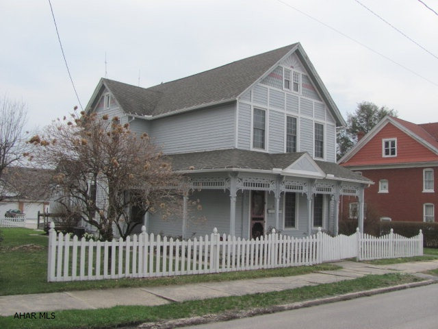 Newly uddated Victorian! Spacious 3 BR, 1.5 Bath with newly finished 3rd floor. Lge fenced lot, Detached large garage boast an apt. above- LR, Kit, bath, 1 Br.This would make a Great B & B.