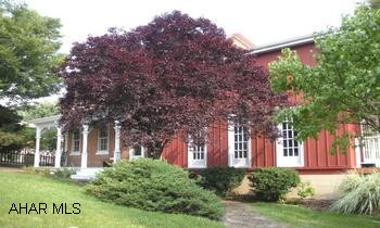 $2500 seller agent bonus & $2500 buyer incentive with an accepted offer by July 25, 2010. Turn-of-the-century home! Beautifully renovated w/large FR addition w/loft & oak floor, exposed stone & brick walls, newer hickory kitchen w/breakfast bar, 3-4 BR, possible 4th on 3rd floor, 2.75 BA, awesome 3rd floor w/skylights & cedar lined closets. All fresh interior & exterior paint, refinished original HDWD floors, & MBR w/private side porch. New landscaping. This property has no zoning, so many possibilities! AHS Warranty included - Core package & service plus package.