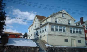 Very spacious 2 story with 4 BR (1 captive) and extra room on 2nd floor.  New windows.  Eat-in kitchen, LR, DR, Den - enclosed front porch with heater and mud room.