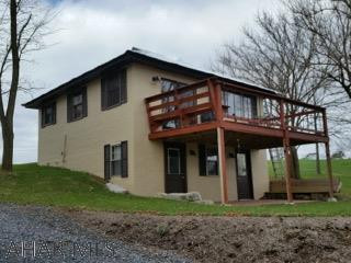 Very private - 2 Bedroom 2 Bath Cabin on 2.27 acres.  Vaulted ceilings, hardwood plank floors, open floor plan.  1 Bedroom Bungalow Cottage with heat and bathroom with outside shower is included with house sale.  Fantastic getaway retreat at $150,000! #JD-430