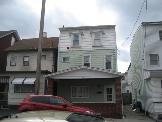 3 Story 5 bedroom with 1.75 baths, fenced yard, 2 car garage is in move in condition. This large 5 bedroom features 2 bedrooms and 3/4 bath on the 3rd floor. Updated electric, high efficiency gasfurnace. 2 car garage. Seller will consider assist