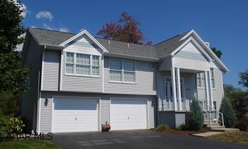 Beautiful bi-level near park in Duncansville.  All newer flooring.  Extremely well maintained home with large, rear no-maintenance deck overlooking a picturesque stream.  Central air, gas fireplace in living room.  Patio under deck.  No flood ins. req. Beautiful bi-level near park in Duncansville.  All newer flooring. Hardwood entry.   Extremely well maintained home with large, rear no-maintenance deck overlooking a picturesque stream.  Central air, gas fireplace in living room.  Patio under deck,  No flood insurance required.  Security system, electric dog fence.