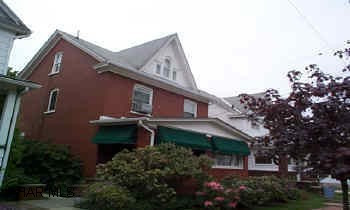 Lovely older home. All brick 4 bedrooms, New Oak Kitchen, All Orginal Trim,Finished attic,Garage, Nice Mature landscaping.