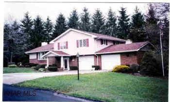 Crestwood Estates - Beautifully updated tri-level, 3 Bedroom home w/ 2 car garage on a tree lined private lot.