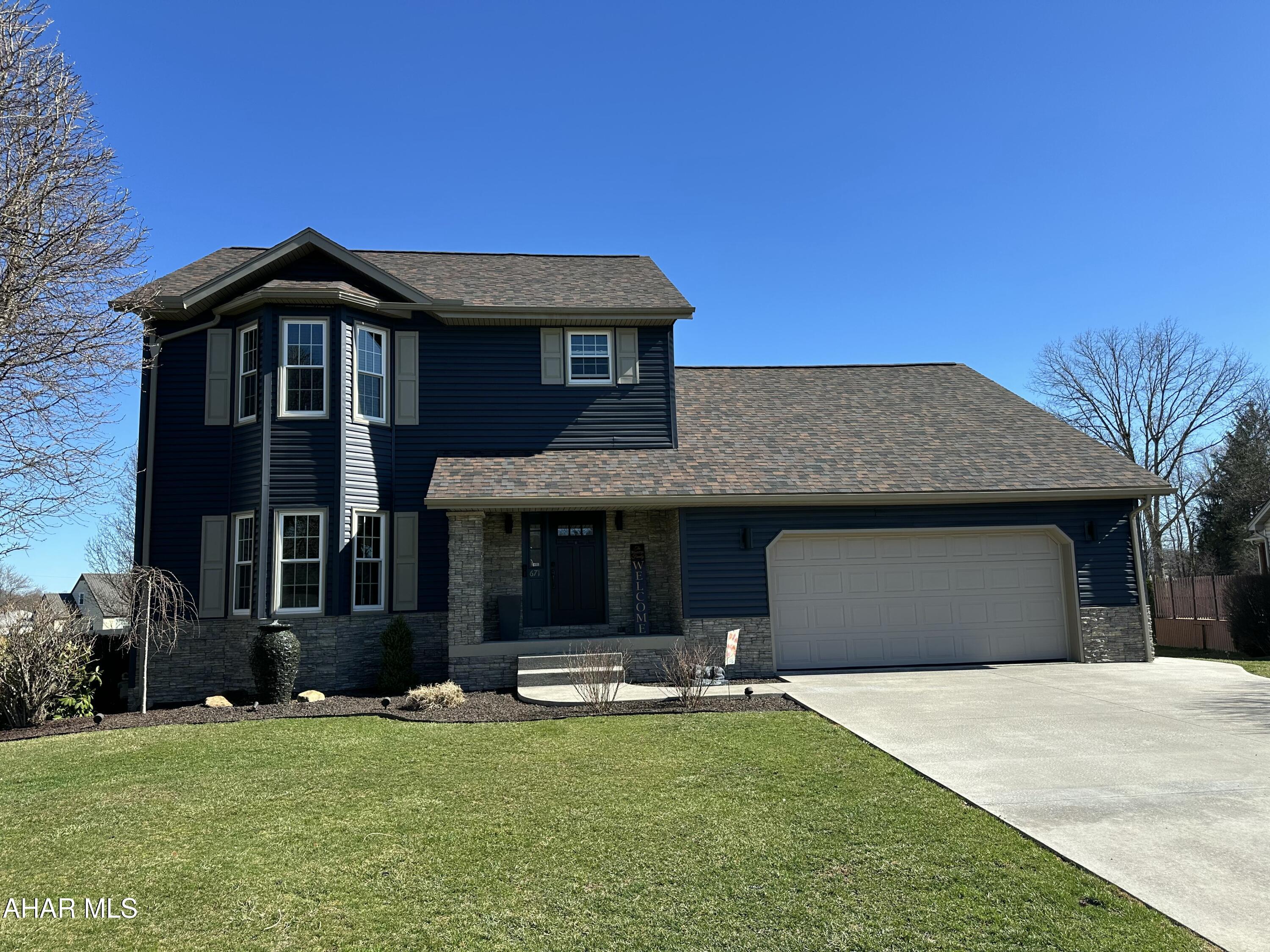 Check out this quality Dempsie built home in the Woodland Terrace neighborhood. This home has been almost completely updated over the past eight years including the siding, roof, and furnace. the main level offers a large living room; formal dining room; kitchen with refaced cabinets, stainless appliances including a wine fridge; and a family room with fireplace and built-in cabinets, from the family room the sliding glass doors open to a covered deck overlooking a 20x40 in-ground, heated pool, (seller is having pool opened by April 1st weather permitting) complete with a pool house with a half bathroom, the  0.76 acre lot is flat and mostly fenced in with a door at the back of the yard opening to a small wooded area and stream, there is a detached garage that is perfect for storing all of your toys, back inside there are 3 bedrooms, owner suite has a beautifully updated bathroom and large walk-in closet, hardwood and tile flooring make the home easy to care for, the basement is partially finished for additional living area, there is even a whole house Generac generator and electric car charger in the garage