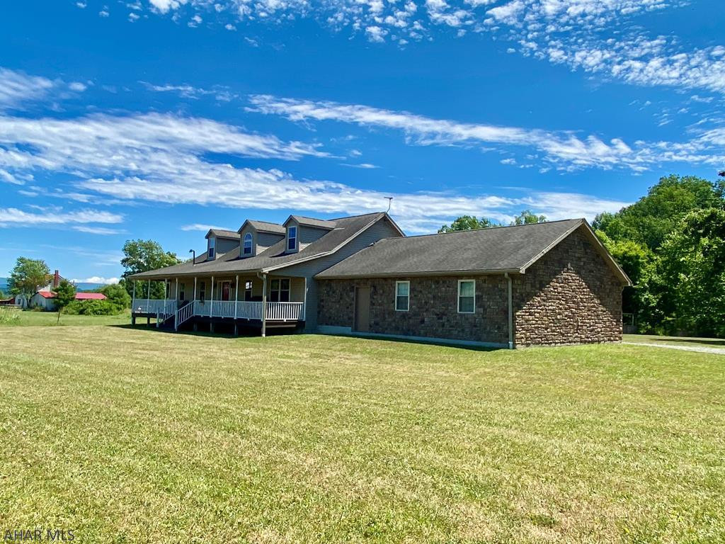 Private yet convenient location, just hours to Pittsburgh, DC & PA TPKE sits this picturesque retreat on 6.83 +/-  acres.   2 covered decks allow owners to enjoy nature, wildlife, gorgeous vistas & walking paths that lead to the babbling brook & meadow.  Inside, one is immediately drawn to the lovely custom made kitchen w/granite counters, huge center island, hickory cabinets, stainless steel appliances and the amazing ceramic detailed flooring.  An owner's suite is located in a private wing with huge walk in closet, custom built bathroom w/ceramic tile and 2 person jacuzzi bath.  2 additional bedroom/office share a large guest bathroom w/ceramic walk in shower.  The upper bonus floor is a fabulous guest retreat with 2 bdrms, bathroom and living space.  High speed internet is available.