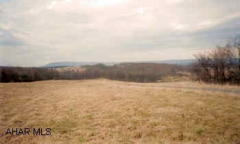 Lot # 2 in Shawnee Settlement. 2 acres with mountain view, underground utilities (telephone and electric) and only minutes from Bedford. Horses permitted. Well to be drilled by buyer, sand mound to be installed by buyer