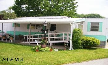 55+ PARK, LOT RENT $230 INCLUDES TRASH, SHED, RAMP