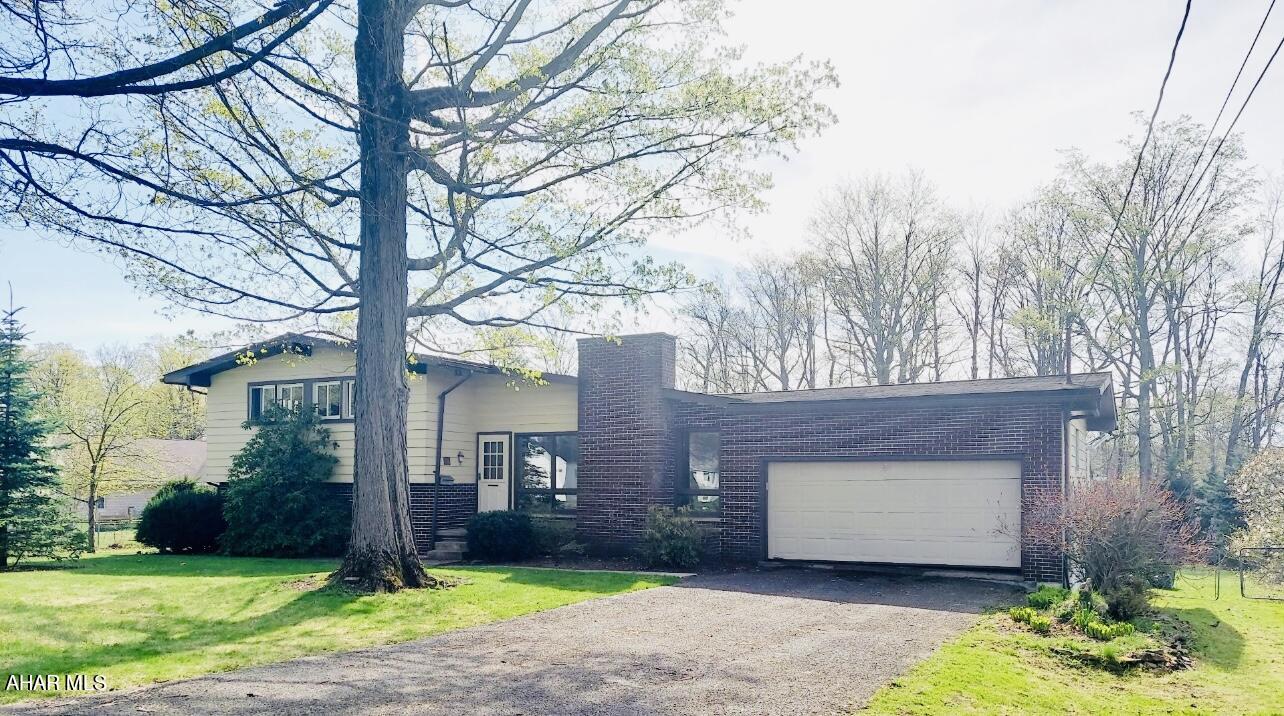 Check out this spacious 3 bedroom 4 bath home with an inviting floor plan that awaits you at this residence in Cresson borough! Home features a multi level design with a screened in porch to take in all of the seasons and great for entertaining!
This residence features spacious formal dining as well as an expansive living room , The lower level of home features an area that could be used for a variety of purposes, guest  quarters, home gym, office, there are many possibilities. The lower level of this residence also features a bar area and a space dedicated to pool. Call today for your tour!