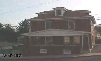 BEAUTIFUL  2 STORY BRICK,4 BEDROOMS,NEW KITCHEN W/CERAMIC FLOOR,DINING ROOM WITH FIREPLACE,LIVINGROOM W/GLASS POCKET DOORS,ALL ORIGINAL WOOD WORK,SUN PORCH,FENCED IN YARD,1 CAR GARAGE,ON CORNER LOT BEAUTIFUL 2 STORY BRICK,ORIGINAL WOOD WORK,4 BEDROOMS.ON CORNER LOT