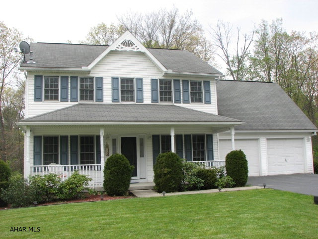 Hollidaysburg schools. Great family home, freshly painted and open floor plan.  Bright and spacious kitchen with island, nicely done master with walk in closet and 11 x 9 master bath.  All rooms are nice size with about 2400 SF total. Finished family room in basement with half bath and additional storage/utility room.  Deck off of kitchen leads to a 24 ft round, above ground pool with new cover.