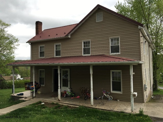 Spacious home on a double lot in Saltillo with beautiful mountain views! The house has 4 large bedrooms and 1  baths. Master bedroom and  bath on the main floor. Inviting covered front porch, vinyl siding, metal roof and a three car, heated detached garage with  bath. Close to Raystown Lake, State Parks, State Game Lands, Pa Turnpike and Interstate 70!