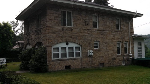 Very Nice stone home with large 2 car garage on 2 acres