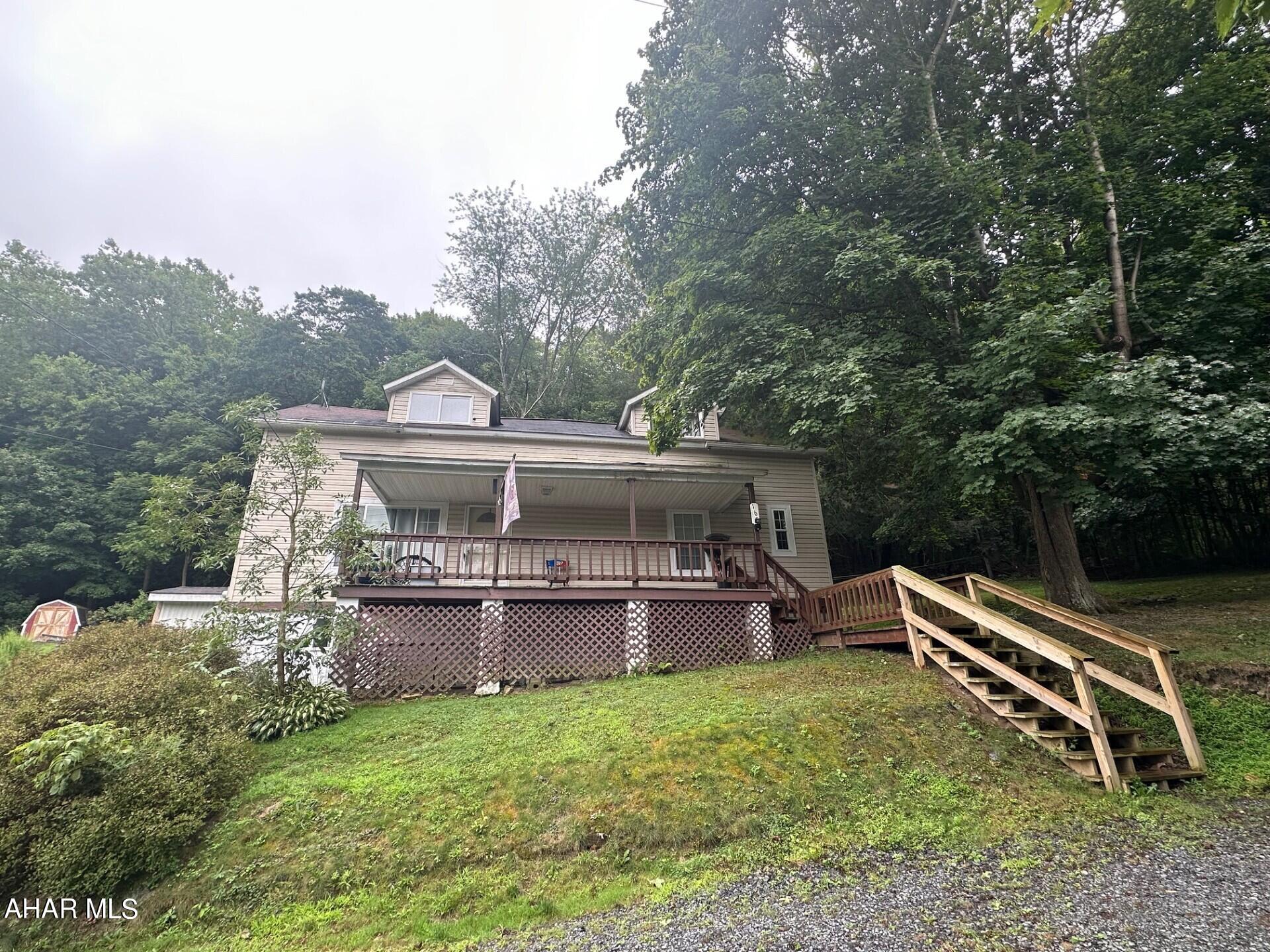 This charming little cape cod on a corner lot in the Coney Island section of Claysburg would be the perfect place to call home.  Features include 2/3 bedrooms, updated 
eat-in kitchen and convenient first floor laundry.  The peaceful backyard setting is great for watching deer and other wildlife.  And the spacious, front porch offers a quiet, hang out spot.  Call me today for your personal tour.