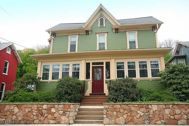 Rich history and beautiful craftsmanship take center stage at this property. Experience the graceful elegance and quality workmanship of that wonderful era. This home boasts 3 large bedrooms and 1 and a half bathrooms.  There is a bonus room off the one bedroom that could be used as an office or another bedroom (4th).  The hardwood floors throughout the home have been recently refinished, both the bathrooms have been remodeled and the very large and beautiful kitchen has a very unique island made from an antique jewelers case.  The kitchen cabinets all have antique drawer pulls. The sliding doors in the kitchen lead to a vey enchanting perennial garden that is awe inspiring. The exterior of the house was recently painted, as well.  Just move in and enjoy this magnificent property.