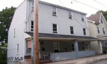 Two story vinyl sided double house. Each unit has 2 bedrooms and finished attic. Two story vinyl sided double house. Each unit has 2 bedrooms and finished attic.