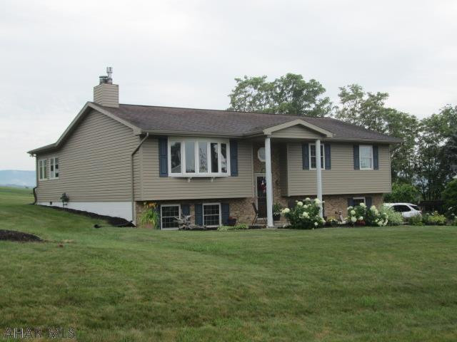 Looking for a private setting? Checkout this well cared for home in Rolling Hills. The living room features a gas fireplace and large bowed window. The updated kitchen has granite tops, an island, and SS appliances. The touchless kitchen faucet is perfect to keep germ free. The added sunroom is heated and cooled. The lower level family room includes another gas stove. All 4 flat screen TV's are included. 50 amp service for RV.