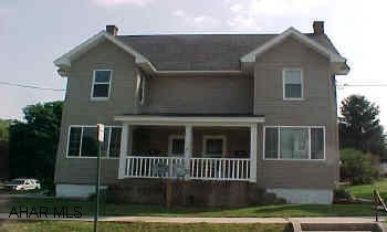 2 units seperate utuilities, large rooms. Tenants pay all utuilities, do own lawn & snow removal. Great investment property. Large rooms, tenants pay all utilities and do lawn work and snow removal. New windows, new vinyl, newer electrical service.