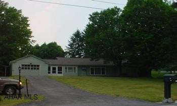 One story located in Sylvan Hills at Frankstown Township. Newer roof, patio under roof, breezeway between garage & house.