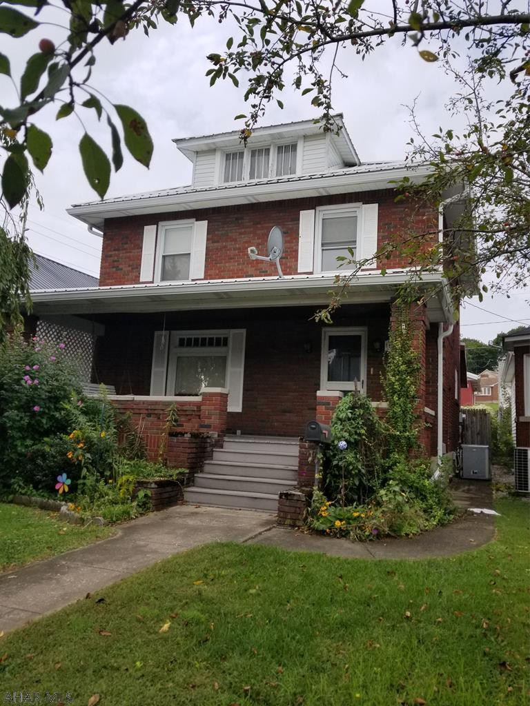 Huge Price Drop!! Great 3 bedroom, 1 bath brick home located on a low traffic road with updated metal roofing.  Hardwood floors on 1st and 2nd levels.   Off the kitchen is a walkout screened porch area.  Large 2 car detached garage for the winter months with garage door openers.  Call today to schedule your private showing.