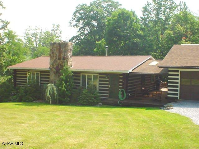 Charming, secluded, log cabin in Hollidaysburg School District! 3 BR, 2 BA, FR w/stone fireplace, great storage, 3 bay garage & ready to move in! Gorgeous setting, old world charm with all of the modern conveniences!