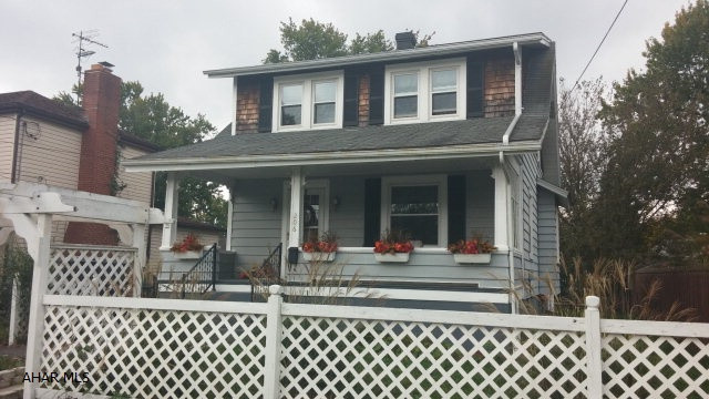This quaint and charming home is packed full of character. Original woodwork melds well with modern colors and new windows. Large modern kitchen has an open and airy sunroom with window seats that just calls you to curl up on and have a hot cup of coffee and enjoy the serene view out back watching the pond with fountain. This house is priced to sell.