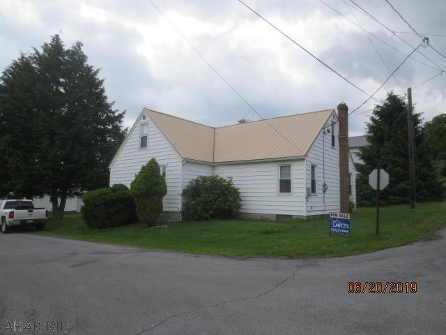 1.5 story well built and updated cozy home. The half story has a half bath and an unfinished 3rd bedroom and potential for a 4th bedroom. Half story is not heated.Hardwood floors on main floor. Courthouse indicates lots are 100'x157. Deed shows 100'x150'