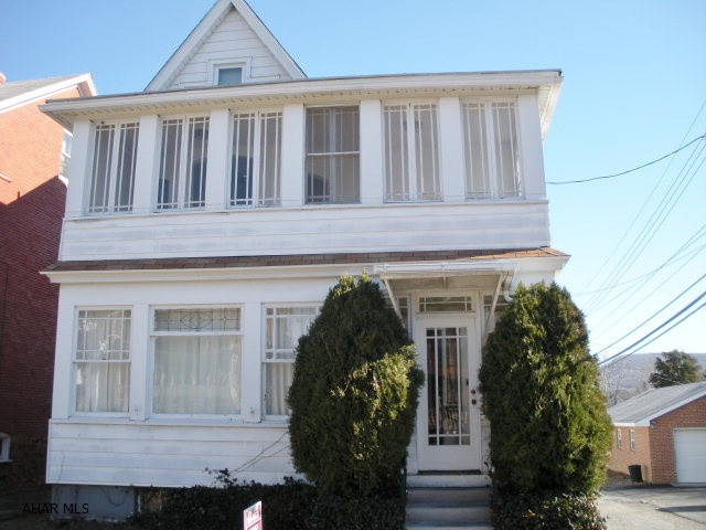 Duplex - 1st floor, 1 bedroom, updated bath, rear deck, fenced yard. 2nd floor, 2 bedrooms, updated kitchen & bath, large living room. Most new windows, newer rolled roof, 100 amp. breakers, 1 car garage. Separate utilities. Washer & dryer in basement included. Walking distance to campus.