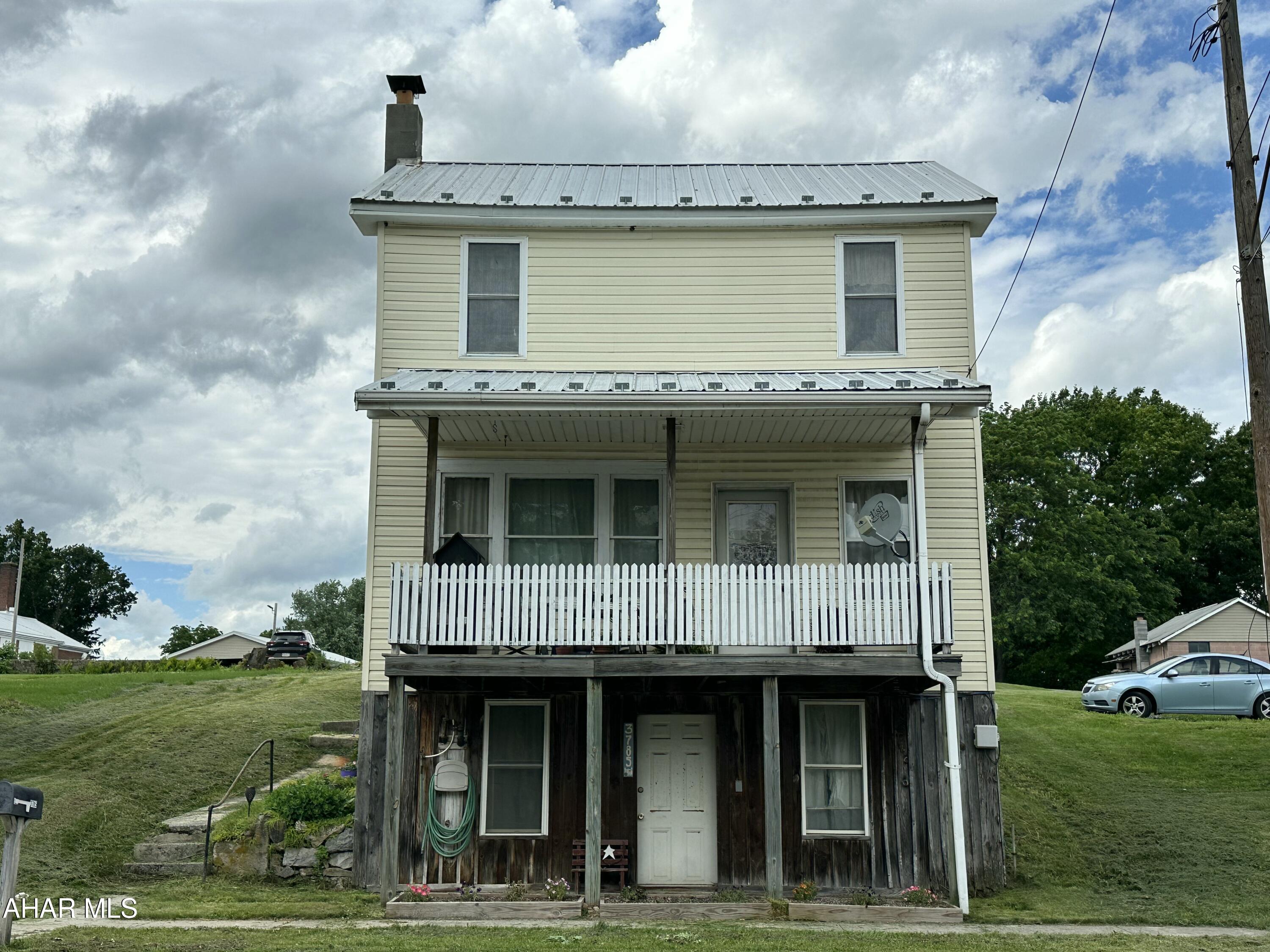 Move in ready with plenty of living  space.  Enjoy warm summer evenings on your back porch.  This home has a large yard and off street parking.  The woodburner in the kitchen stays.  This home may be the one for you.