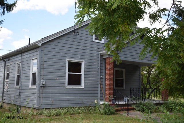 Fixer upper being sold as is. Hardwood floors.  Tons of potential.  Lovely neighborhood in quiet section of the borough near YMCA and schools.  Put your tool belt on and make this house awesome!