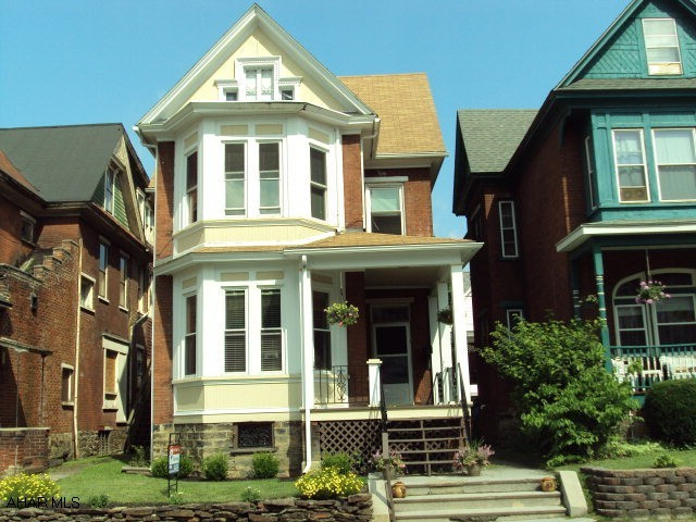 Turn of the century victorian.  Features 4 bedrooms, large living room, diningroom and eat in kitchen, laundry on first floor, low taxes, fenced in yard.