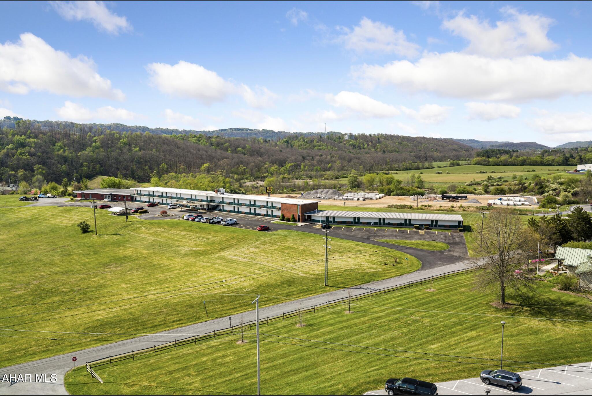 Motor Inn is a 48 room motel situated on approximately 12 acres in a prime location near major highway access. (Route 22, and Route 26). Currently generating $700,000 in gross annual income while operating 9 months out of the year, this property offers strong value-add potential. Features include an attached restaurant space ready for reactivation and ample land for future expansion or amenities. Located just minutes from a high-traffic recreational lake attracting 1.5-2 million visitors annually, this property is positioned in a thriving tourism corridor. Offered at $2,770,000 this rare opportunity to acquire a cash-flowing hospitality asset with significant upside doesn't come up often!