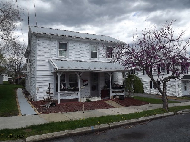 Good curb appeal; interior needs complete remodel. Water off due to break at house. Electric is on. AS-IS purchase.
