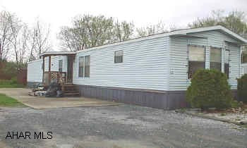 2 BR, 2 Bth on lg lot. Quiet area. Built in stereo, china closet, 3 ceiling fans, C/A, Thermopane windows, Dry wall, new carpet, 200Amp,lot rent $260.00 (includes Trash, Water/Sewer, Snow Removal)     2Br, 2Bth MH on lg rented lot. New carpet in Br & hall, built in stereo,C/A, Thermopane windows,Peaked shingled roof, finished drywall, Cathedral ceilings,Shed w/ elec. Like new.Seller will consider reduction for cash buyer.
