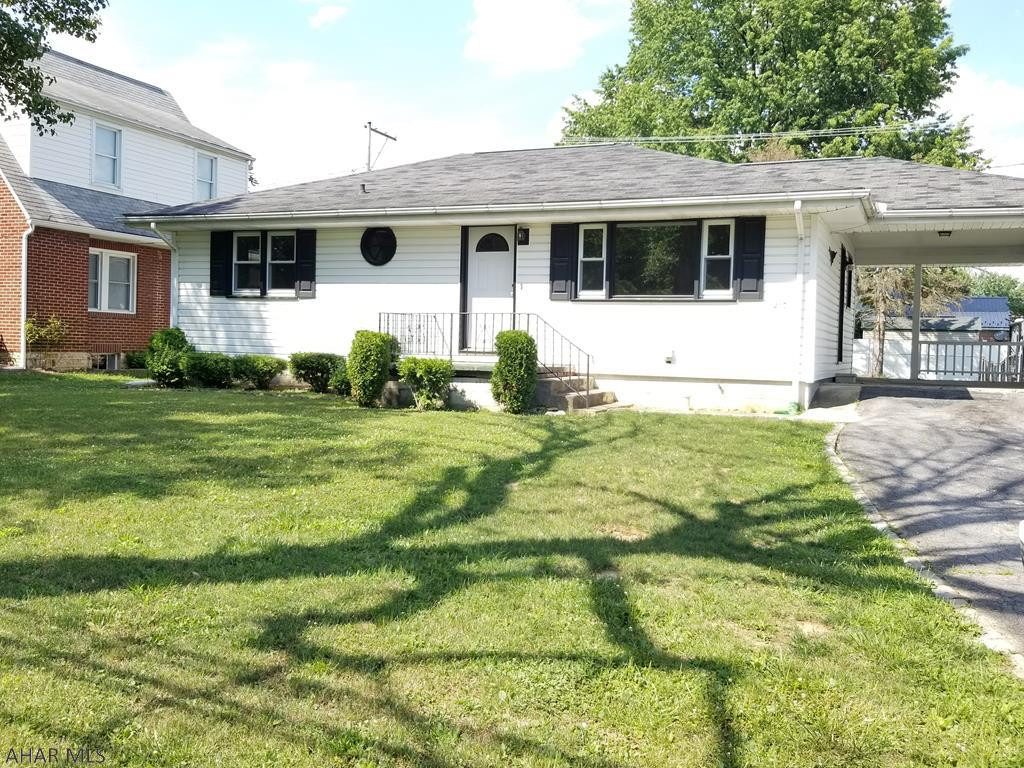 Fully  Renovated Charming ranch home in the Hollidaysburg Borough! Beautiful Eat-in kitchen that features granite countertops, custom made oak kitchen cabinets, and a tile backsplash. Spacious living room with hardwood floors. All 3 bedrooms have gorgeous hardwood floors. Remodeled full bath on the main floor. Huge family room in the finished basement!  renovated and is ready for entertaining on football weekends! Remodeled 1/2 bath adjacent to family room. Fresh paint throughout the entire home. Fenced-in back  yard, off-street parking, and a carport. this home has been completely updated including plumbing , electric, and  new sewer line in 2018.  all this Within walking distance to Legion Memorial Park!