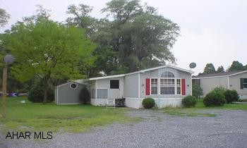 1986 Marlette mobile home (14x70) with MBR w/MBA, EIK, LR,  BR, BA, & laundry. Features cathedral ceilings, large screened-in covered porch and utilitiy shed. Minutes from PA turnpike and Lake Raystown. 1986 Marlette mobile home (14x70) with MBR w/MBA, EIK, LR, BR, BA & laundry. Features cathedral ceilings, large screened-in covered porch and utility shed. Minutes from PA turnpike and Lake Raystown.