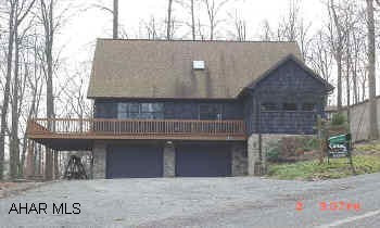 Attractive, Bright & Cheery Chalet , 3 Spacious Bedrooms, 2 Full Baths, M-Bed Room & M- Bath on First Floor, Large Deck looking out into the woods, 2 Car Integral  Garage, Maintenance Free,  many extras, Close to State Game Lands, Jusst minutes from P Attractive, Bright & Cheery Chalet,  3 Spacious Bedrooms,2 Full Baths, M-Bed Room & M-Bath on 1 st. Floor, Large Deck looking out into the woods, 2 Car garage, Maintenance Free, many extras.   All the Amenities of Glendale Yearound, Swimming Pool, Tennis courts